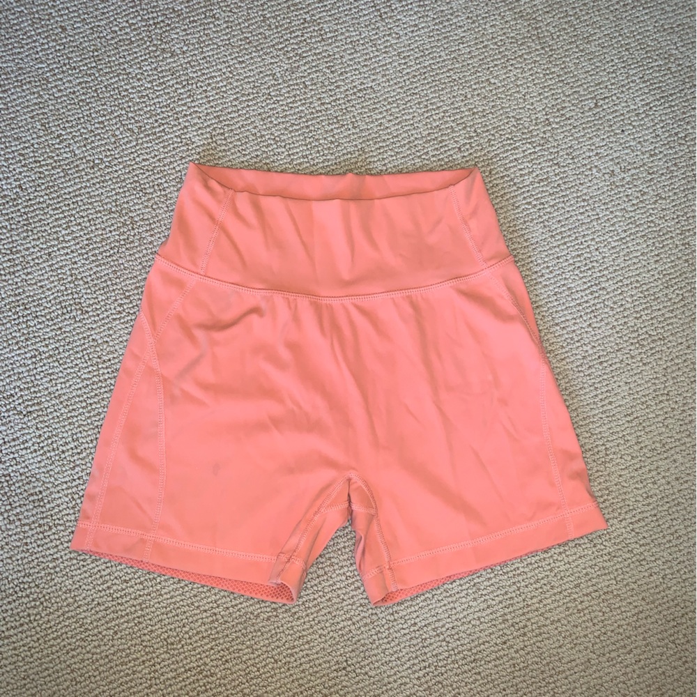 BuffBunny orange shorts size M